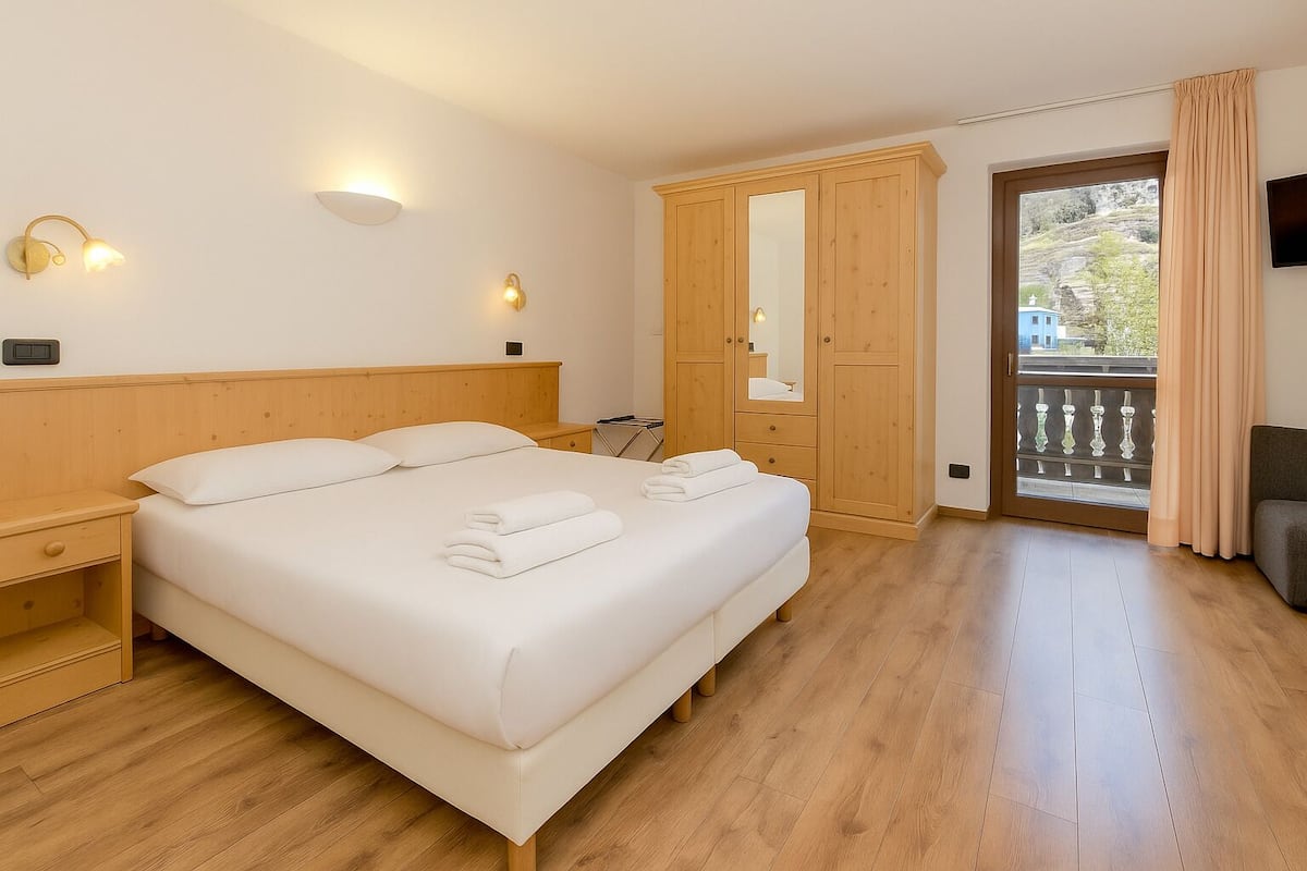 Superior Quadruple Room, Balcony | In-room safe, desk, iron/ironing board, cots/infant beds