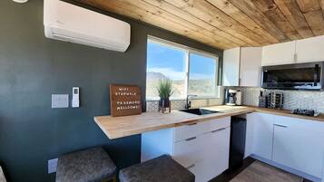 Fridge, microwave, stovetop, coffee/tea maker