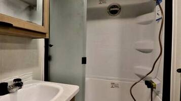 Hair dryer, towels, soap, shampoo