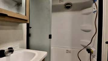 Hair dryer, towels, soap, shampoo