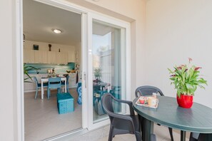 Outdoor dining - Casa Lidia, with Shared Pool, Private Parking and Garden; Bouganville Residence in Viddalba (Viddalba)