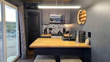 Fridge, stovetop, coffee/tea maker, toaster