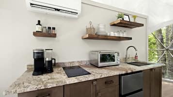 Coffee/tea maker, fridge, microwave, cookware/dishes/utensils