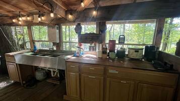 Fridge, stovetop, coffee/tea maker, cookware/dishes/utensils
