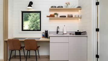 Microwave, stovetop, coffee/tea maker, cookware/dishes/utensils
