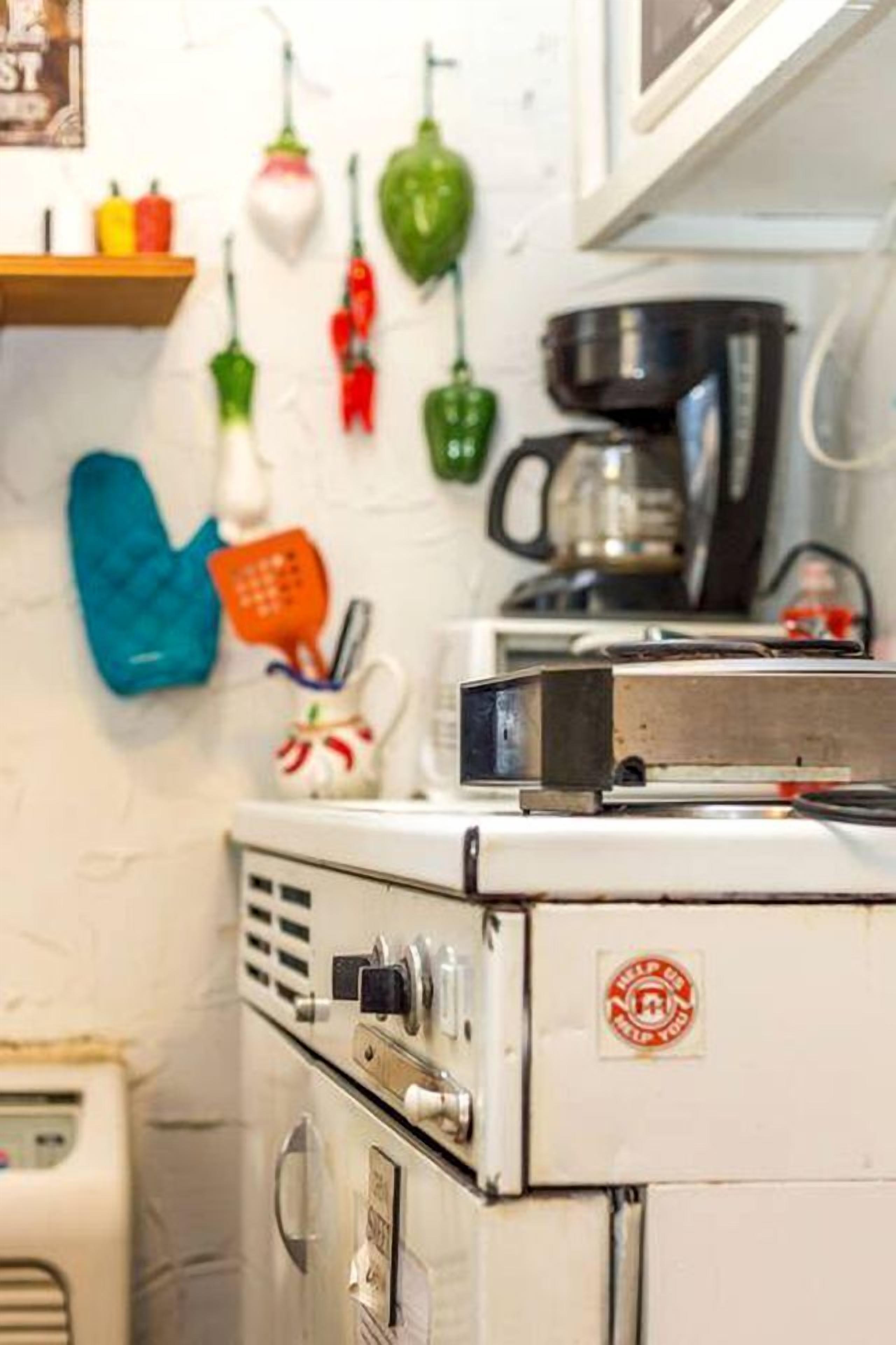 Coffee/tea maker, fridge, microwave, oven
