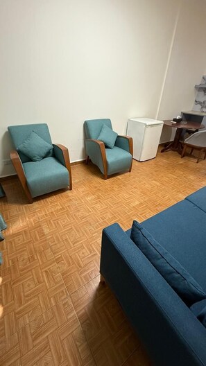 Suite estudio junior | Área de sala de estar