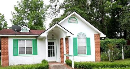 Quaint Cottage with Covered Dock on the Pond and Walking Trails in Georgia