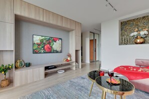 Deluxe-Apartment, 1 Schlafzimmer, Meerblick | Wohnbereich