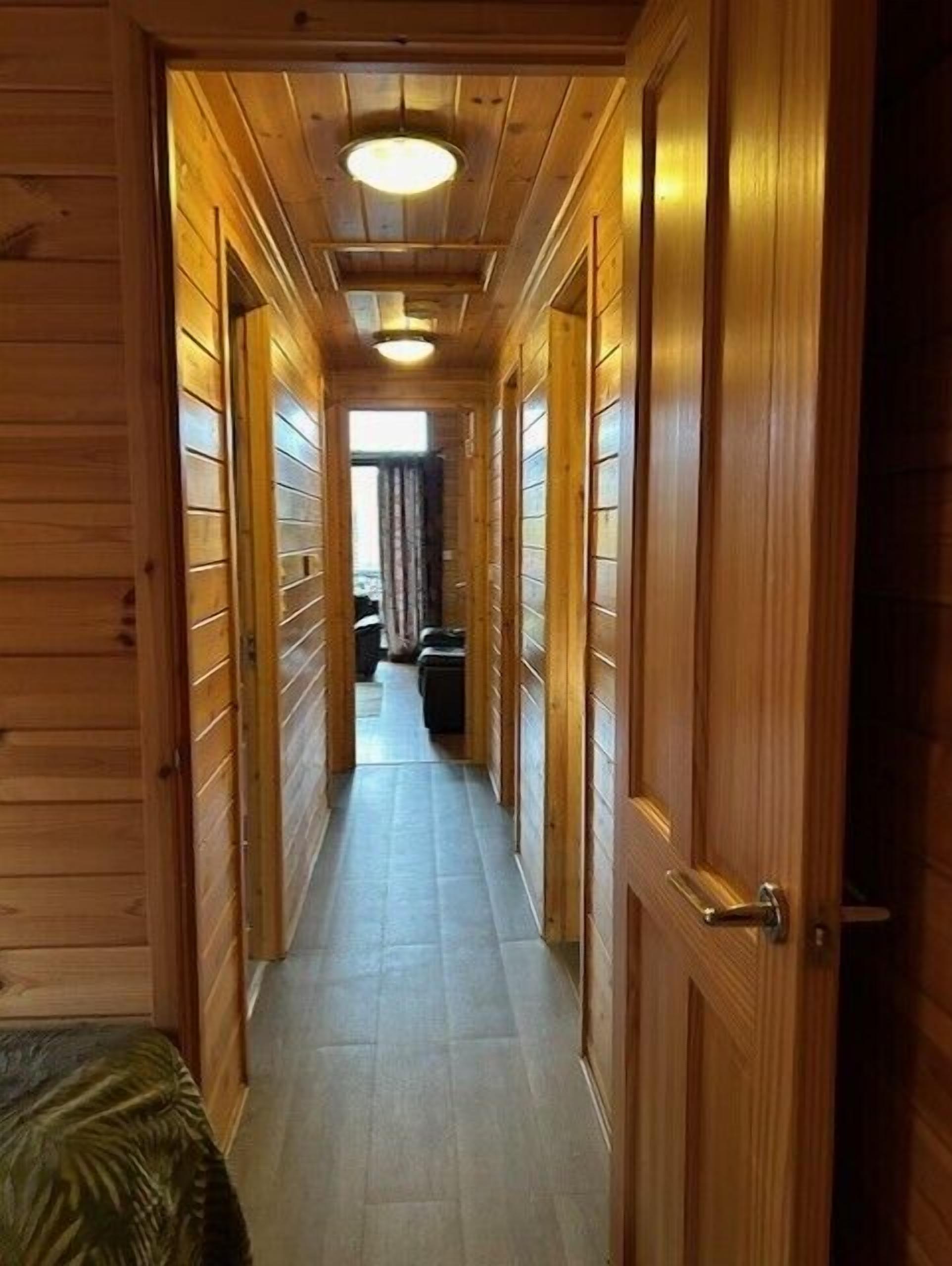 Superior Cabin, 3 Bedrooms (Lodge 6. Pets - With Hot tub) | Iron/ironing board, free cots/infant beds, travel cot