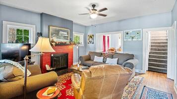 TV, fireplace, books