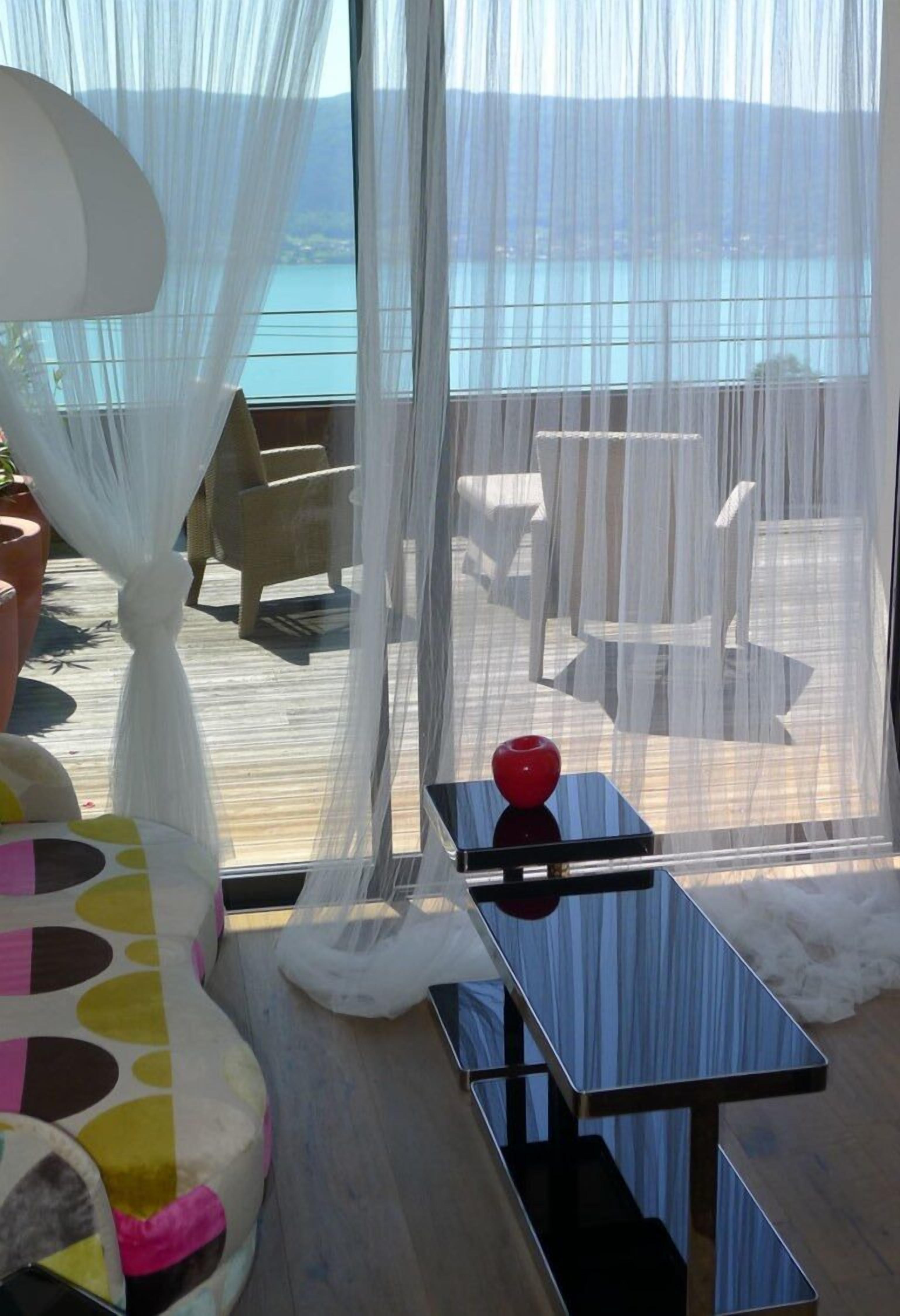 Deluxe Room, 1 Queen Bed, Terrace, Lake View | Premium bedding, minibar, individually decorated, individually furnished