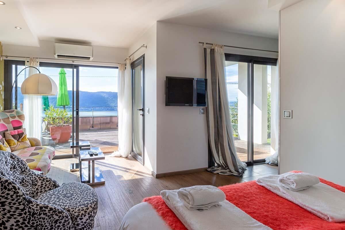 Deluxe Room, 1 Queen Bed, Terrace, Lake View | Premium bedding, minibar, individually decorated, individually furnished