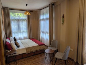 Superior Triple Room, Garden View | Premium bedding, Tempur-Pedic beds, free WiFi, bed sheets - Explorers Kilimanjaro Boutique Hotel (Moshi)