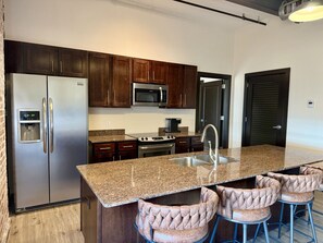 Fridge, microwave, oven, stovetop - Downtown Dream - A Home Run in the Arts District (Tulsa)