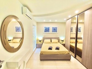 Fer et planche à repasser, lit parapluie, Wi-Fi, draps fournis