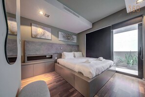 2 bedrooms, desk, iron/ironing board, travel crib