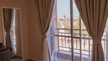 In-room safe, desk, laptop workspace, blackout curtains
