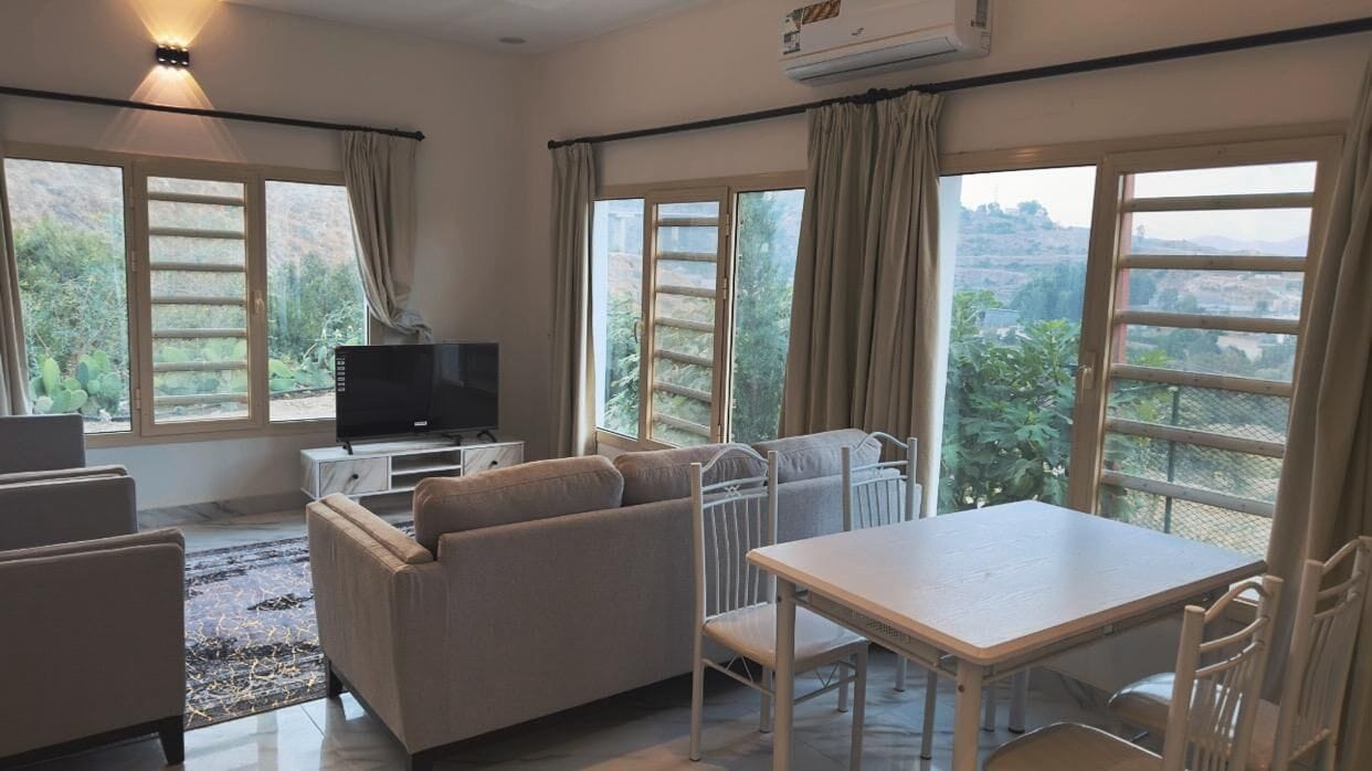 Comfort Villa, Valley View | Living area | 48-inch Smart TV with digital channels