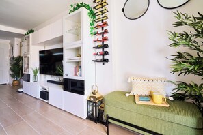 Smart TV, fireplace, books