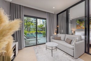 Appartamento Exclusive, 1 letto king con divano letto, terrazzo, vista piscina | Soggiorno