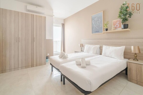 2 bedrooms, desk, iron/ironing board, travel crib