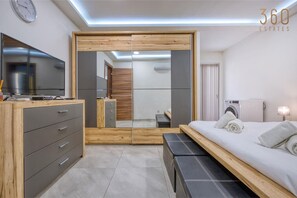2 bedrooms, desk, iron/ironing board, travel crib