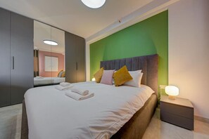 1 bedroom, desk, iron/ironing board, travel cot