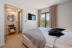 4 عدّة غرف نوم ومكواة/لوح كي وواي فاي مجانًا وملاءات أسرّة