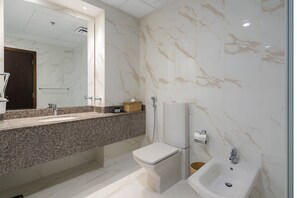 Hair dryer, bidet, towels, soap