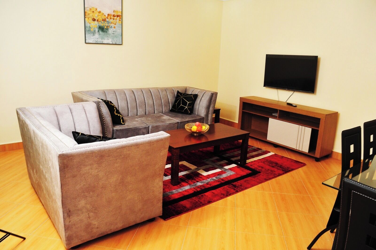 Deluxe Apartment, City View | Living area | 32-inch Smart TV with digital channels