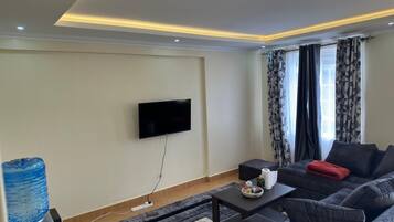 Family Apartment, City View | Living area
