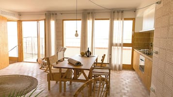 Deluxe Studio, Terrace, Sea View | Living area | 42-inch LED TV with cable channels