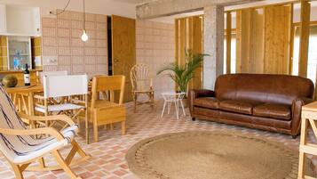Deluxe Studio, Terrace, Sea View | Living area | 42-inch LED TV with cable channels