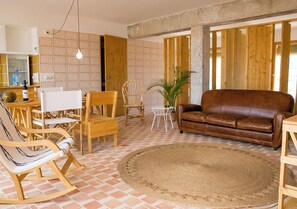 Deluxe Studio, Terrace, Sea View | Living area | 42-inch LED TV with cable channels