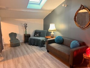 Deluxe kamer, uitzicht op rivier | Woonruimte