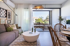 102 - City view 1 BR & Balcony | Living room | 43-inch Smart TV with digital channels, streaming services - Jas Living Apts & Balconies in Larnaca  (Livadia)