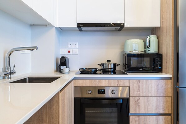 101 - City view 1 BR & Balcony | Private kitchen | Full-sized fridge, microwave, oven, stovetop