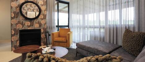 Suite, Patio, Courtyard View | In-room safe, iron/ironing board, free WiFi