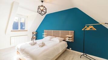 2 slaapkamers, een strijkplank/strijkijzer, reisbedje, wifi