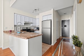 Superior Condo, 1 Bedroom, Balcony, Lake View | Private kitchen | Fridge, microwave, oven, stovetop
