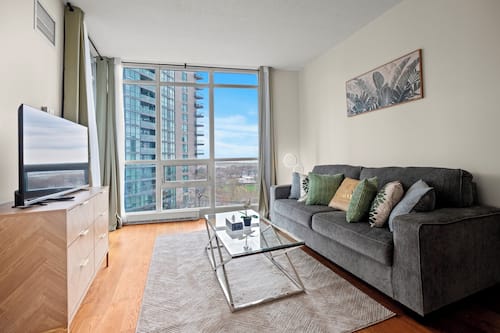 Superior Condo, 1 Bedroom, Balcony, Lake View | Living area | 43-inch flat-screen TV with satellite channels, Netflix
