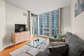 Superior Condo, 1 Bedroom, Balcony, Lake View | Living area | 43-inch flat-screen TV with satellite channels, Netflix - Atlantis at Waterpark City Condos in DT (Toronto)