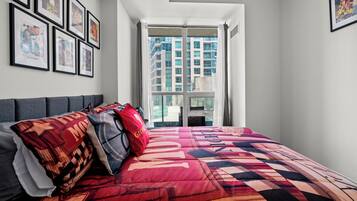 Deluxe Condo, 1 Bedroom, Balcony, City View | Individually decorated, individually furnished, desk, laptop workspace