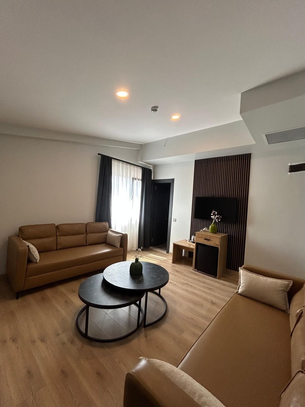 Business Suite, Balcony, City View | Desk, laptop workspace, blackout drapes, iron/ironing board