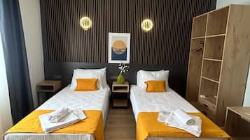 Standard Twin Room, City View | Desk, laptop workspace, blackout drapes, iron/ironing board