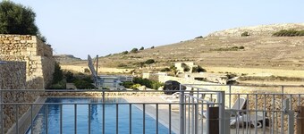 3-bedroom apartment in Għarb with stunning Views and hotel amenities