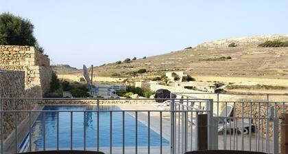 3-bedroom apartment in Għarb with stunning Views and hotel amenities