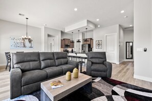 TV, fireplace - Caddyshack by Mesquite Vacation Rentals in Val Vista w/ pool, putting green and over $500 in complimentary daily activities! (Mesquite)