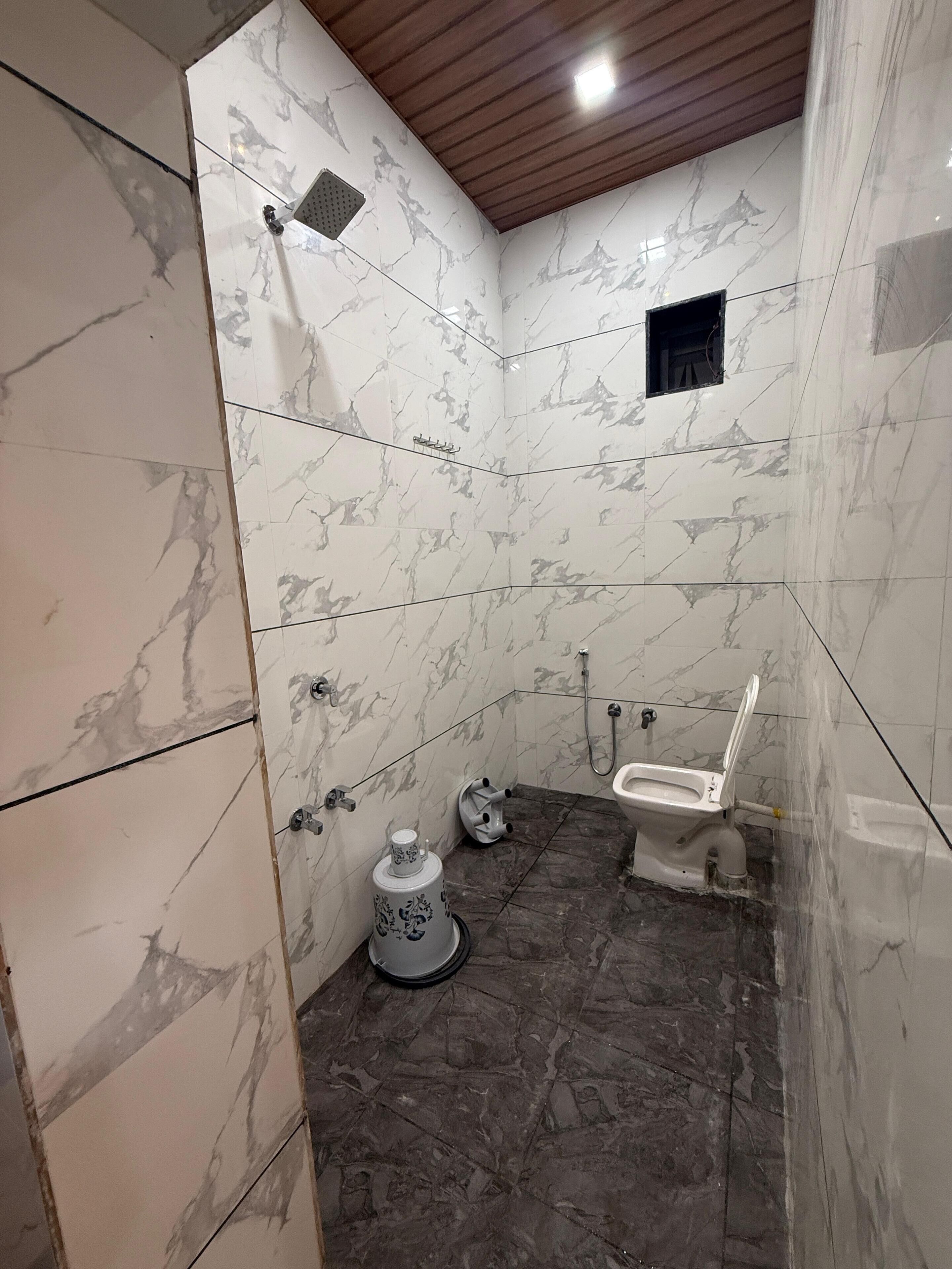 Shower, eco-friendly toiletries, towels, soap
